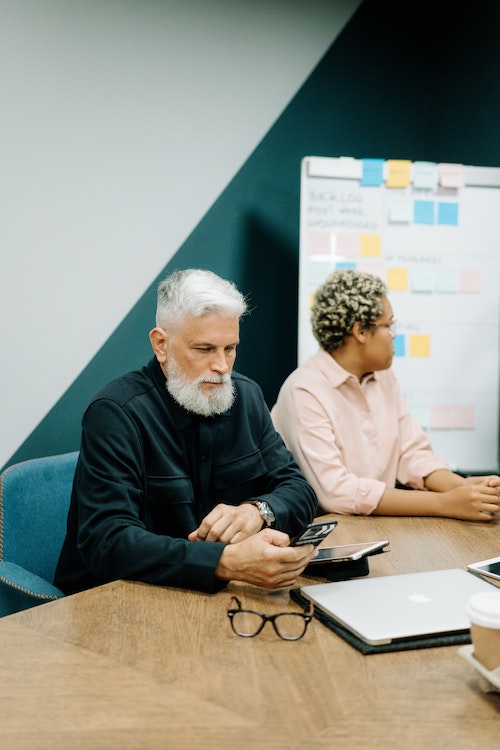 two people in a working environment